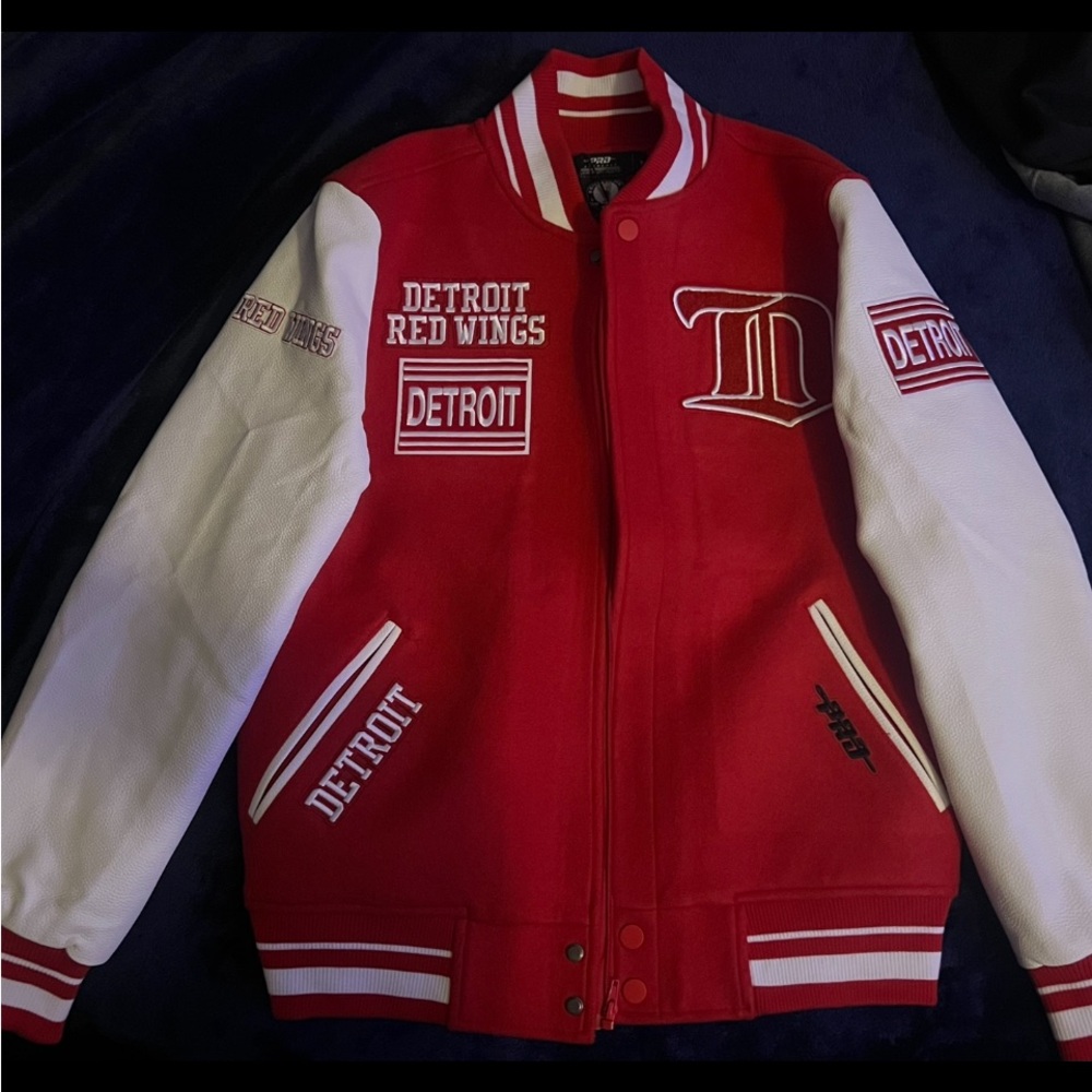 Red and white leather sleeve 
varsity redwing jacket